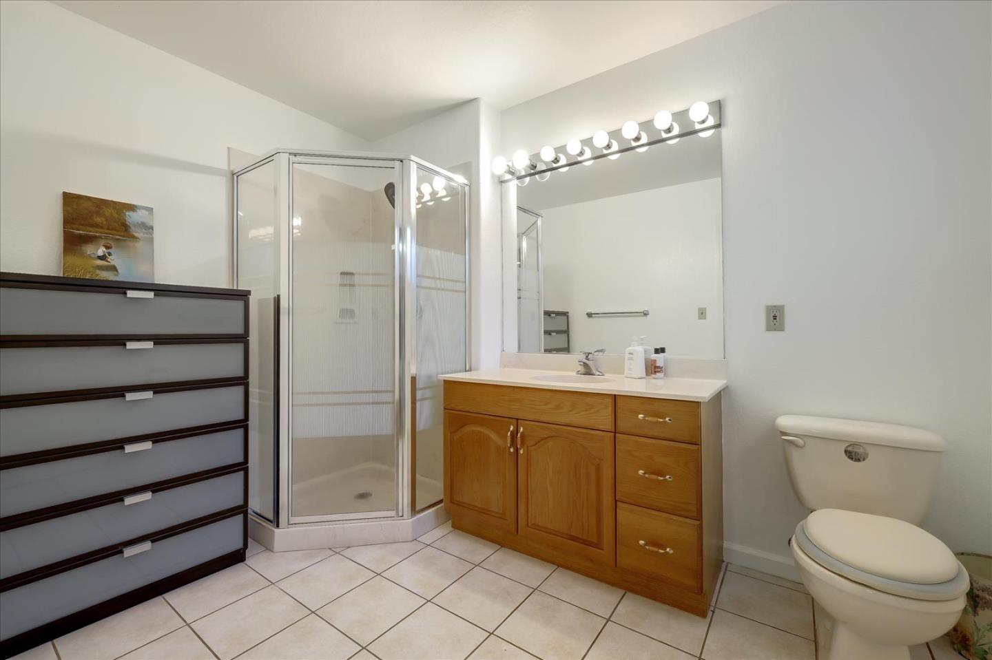 Toyon Road Atherton, CA 94027 - Photo 21 of 21 a spacious bathroom with a toilet sink and mirror