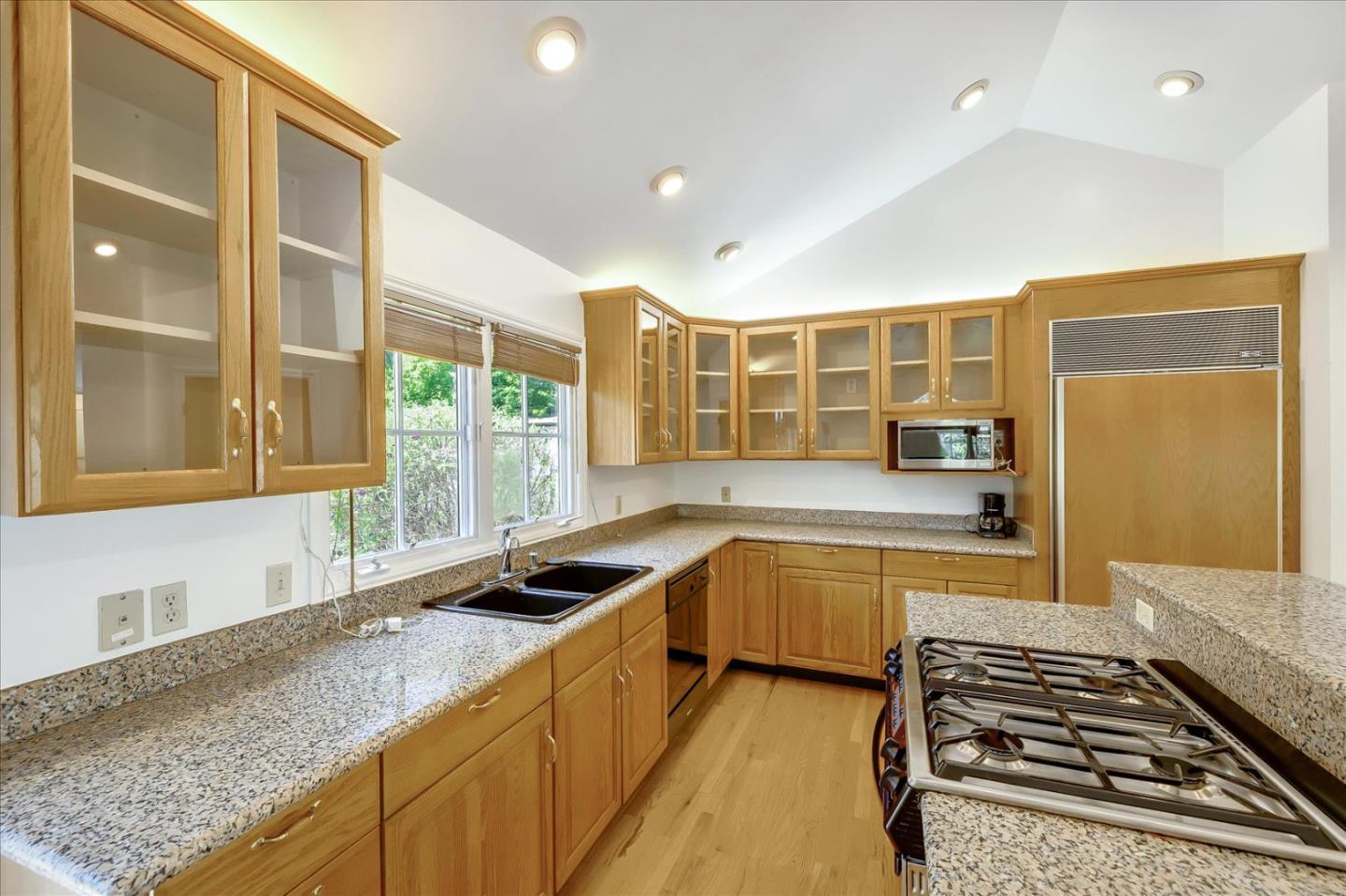 Toyon Road Atherton, CA 94027 - Photo 8 of 21 a kitchen with stainless steel appliances granite countertop a sink and a stove