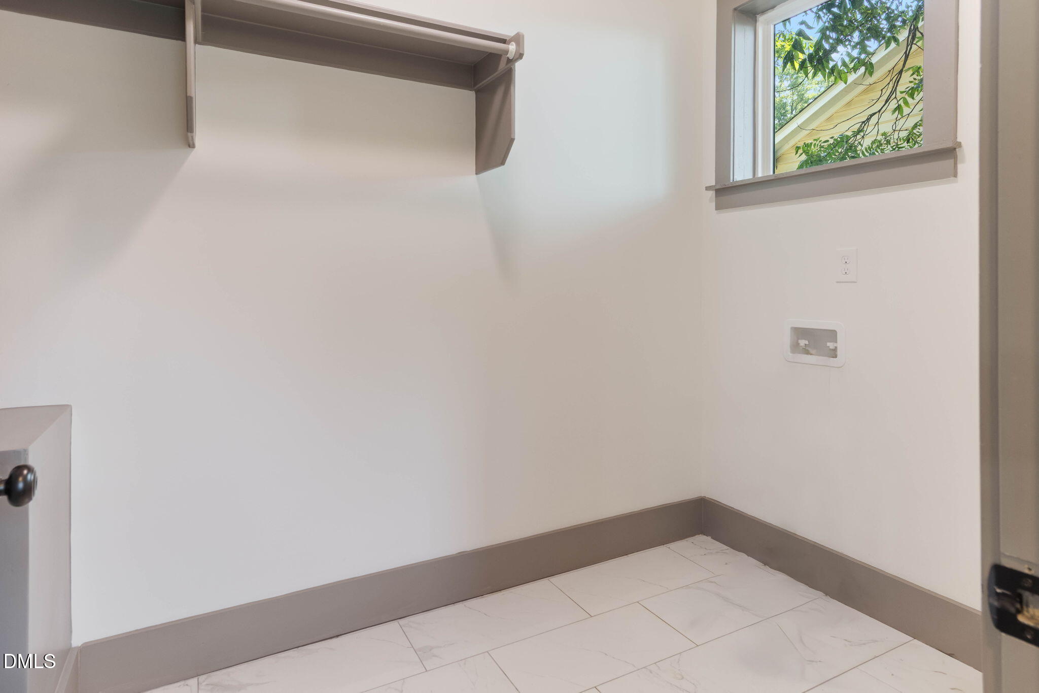 602 Hay Lane Raleigh, NC 27601 - Photo 16 of 43 a view of a small space with wooden floor and a window