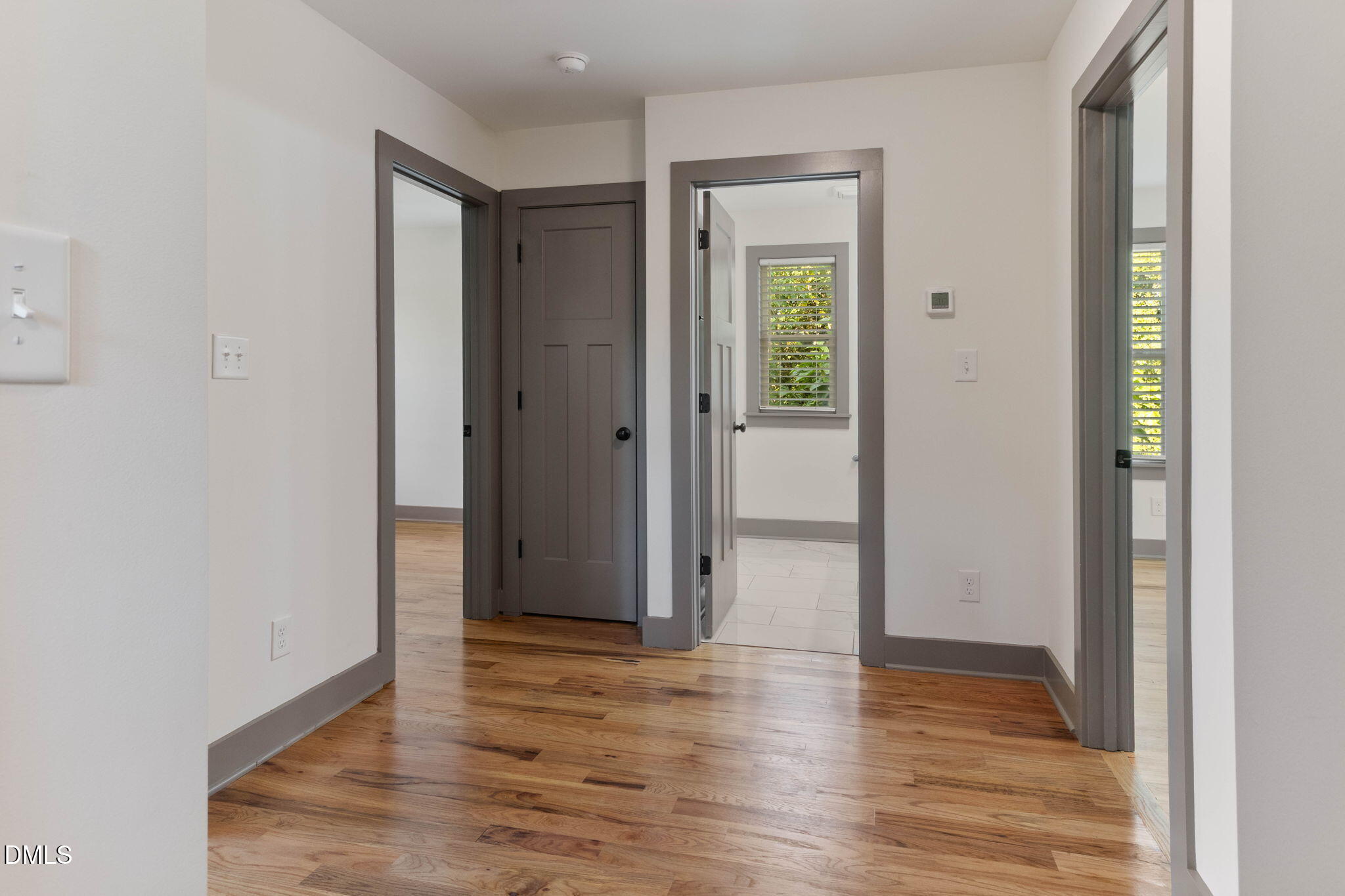 602 Hay Lane Raleigh, NC 27601 - Photo 19 of 43 a view of entryway with wooden floor