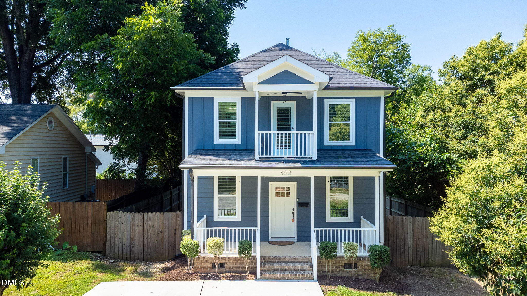 602 Hay Lane Raleigh, NC 27601 - Photo 3 of 43 a front view of a house with a yard