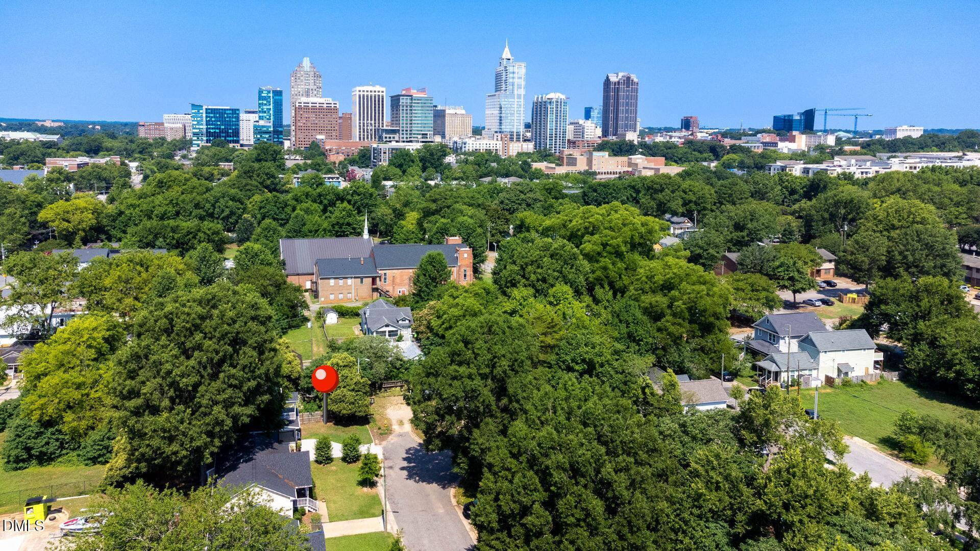 602 Hay Lane Raleigh, NC 27601 - Photo 6 of 43 a view of a city with tall buildings
