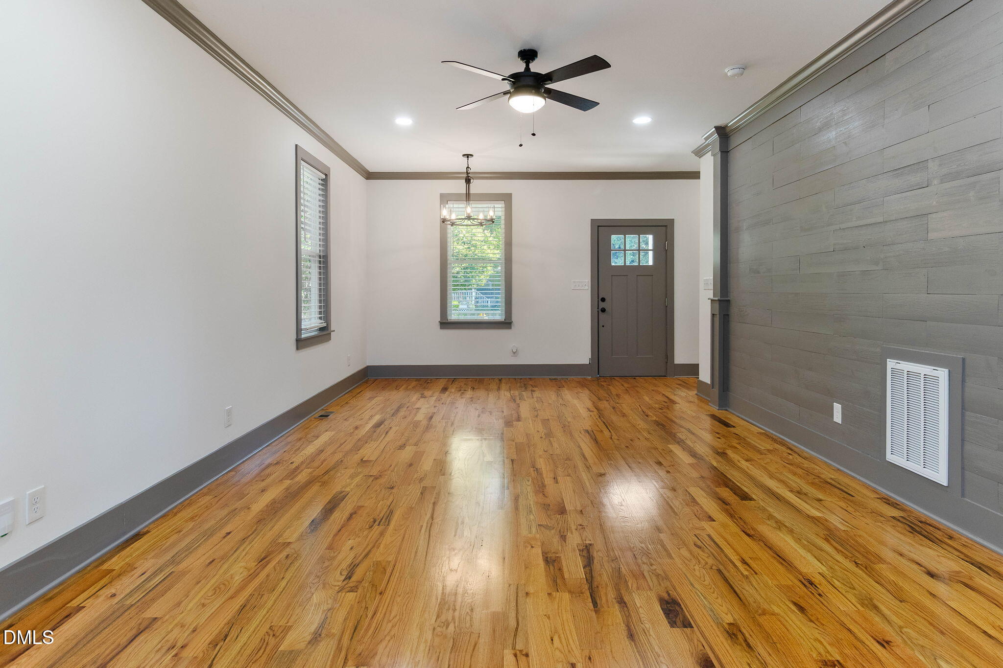 602 Hay Lane Raleigh, NC 27601 - Photo 9 of 43 a view of empty room with wooden floor and fan
