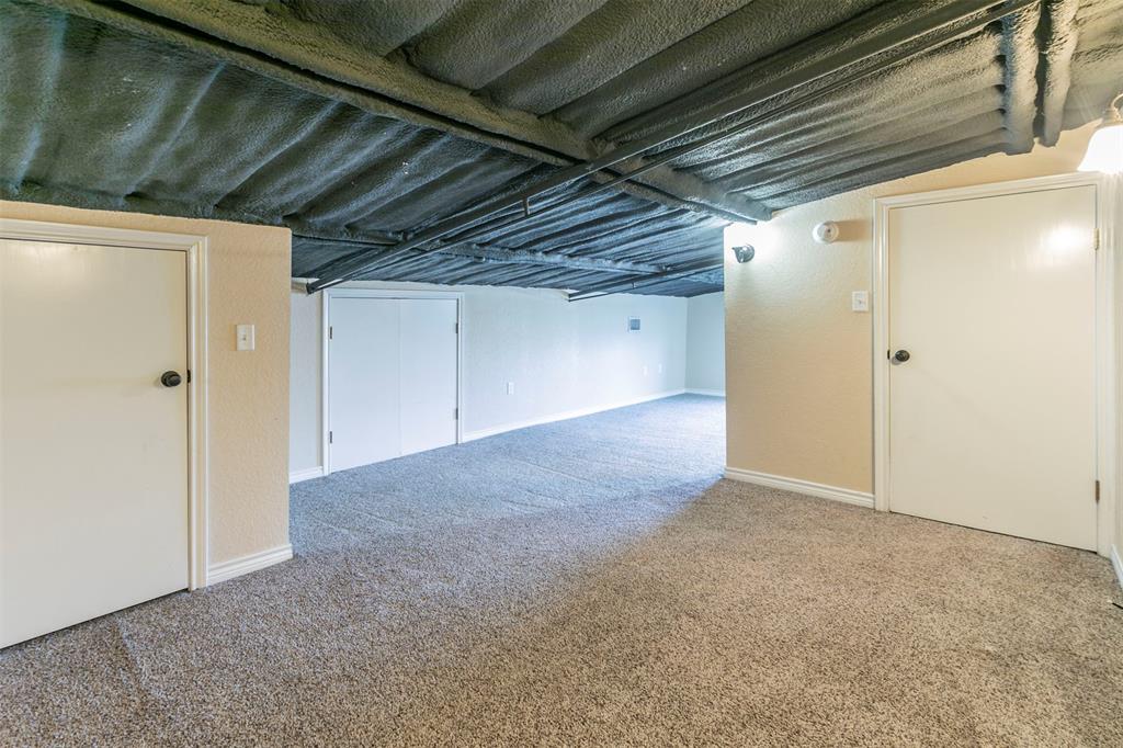 32471 Highway 108 Mingus, TX 76463 - Photo 19 of 40 Finished below grade area featuring carpet and baseboards