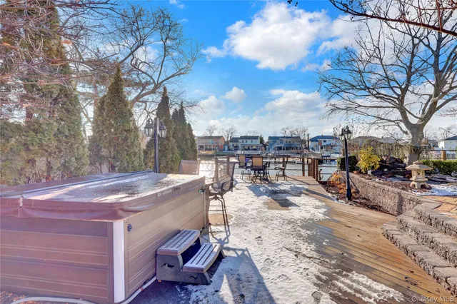 a view of a backyard with large trees