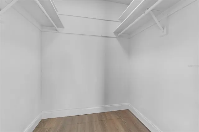 a view of an empty walk in closet