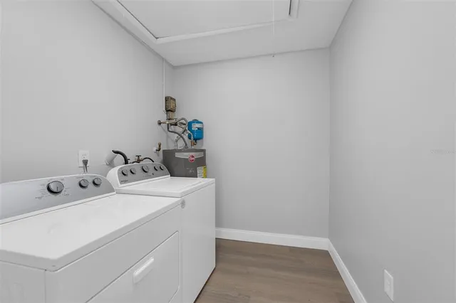 a utility room with dryer and washer