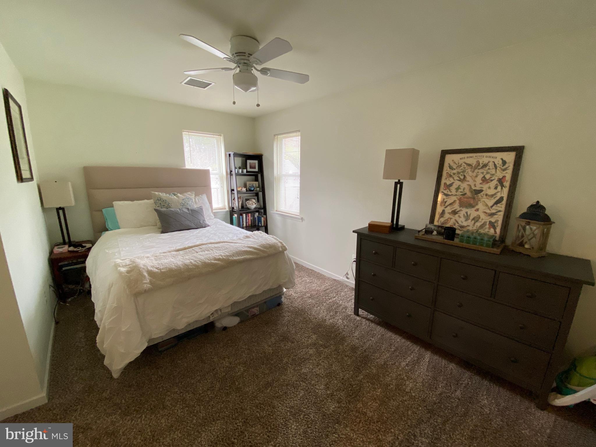 13 Brookside Road Glenside, PA 19038 - Photo 12 of 22 a bedroom with a bed and window