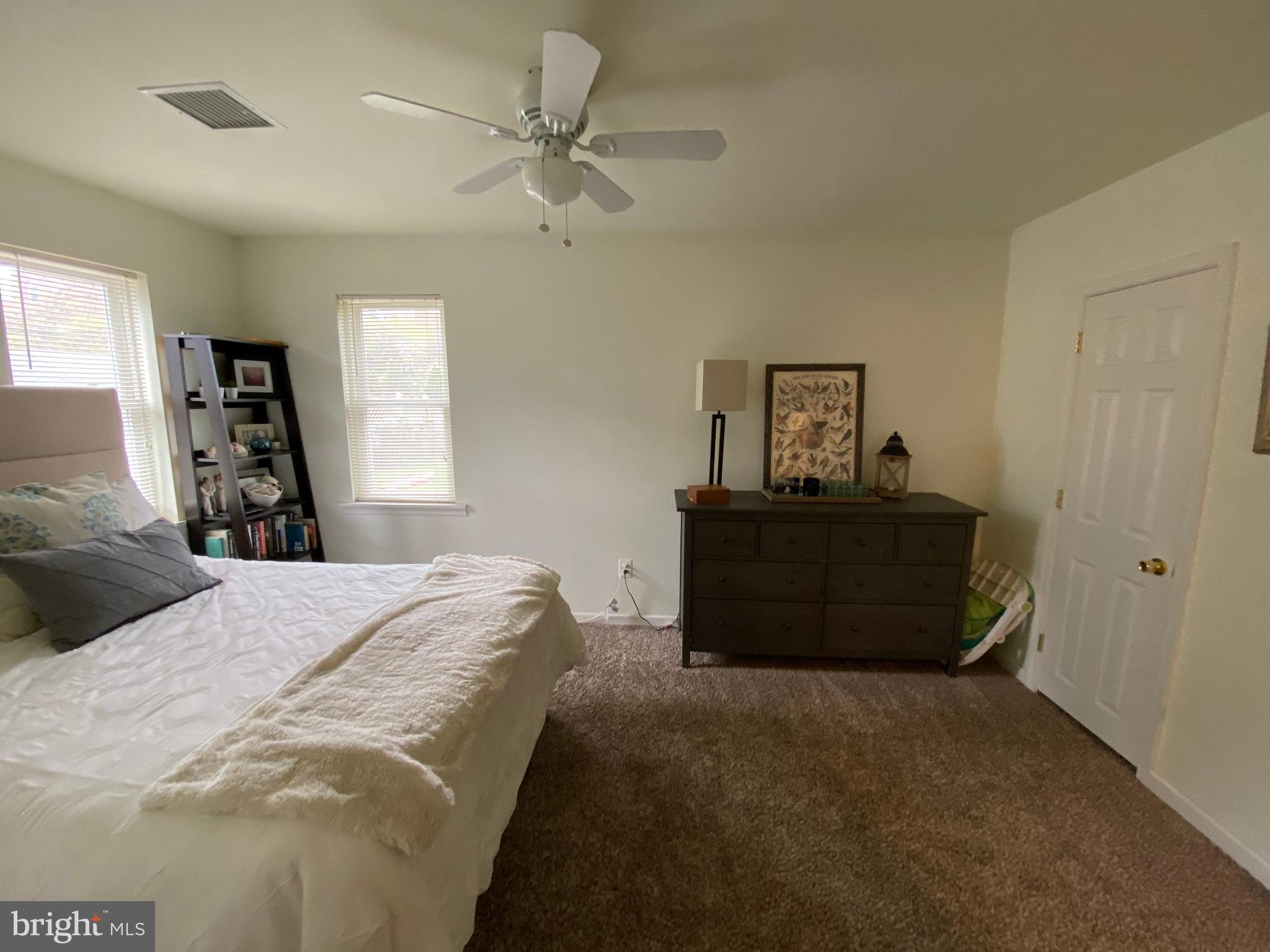 13 Brookside Road Glenside, PA 19038 - Photo 13 of 22 a bedroom with a bed and window