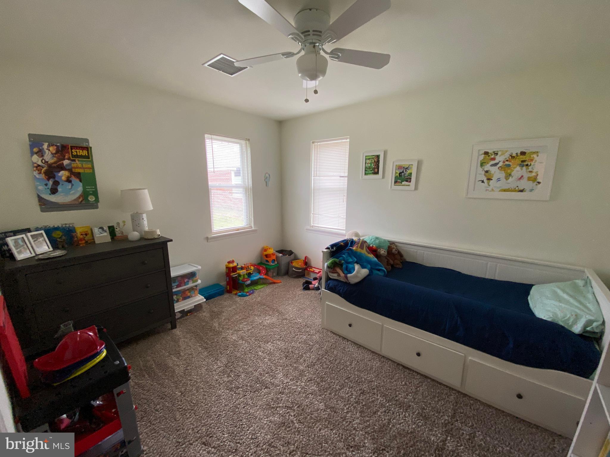 13 Brookside Road Glenside, PA 19038 - Photo 14 of 22 a bed room with furniture and a window