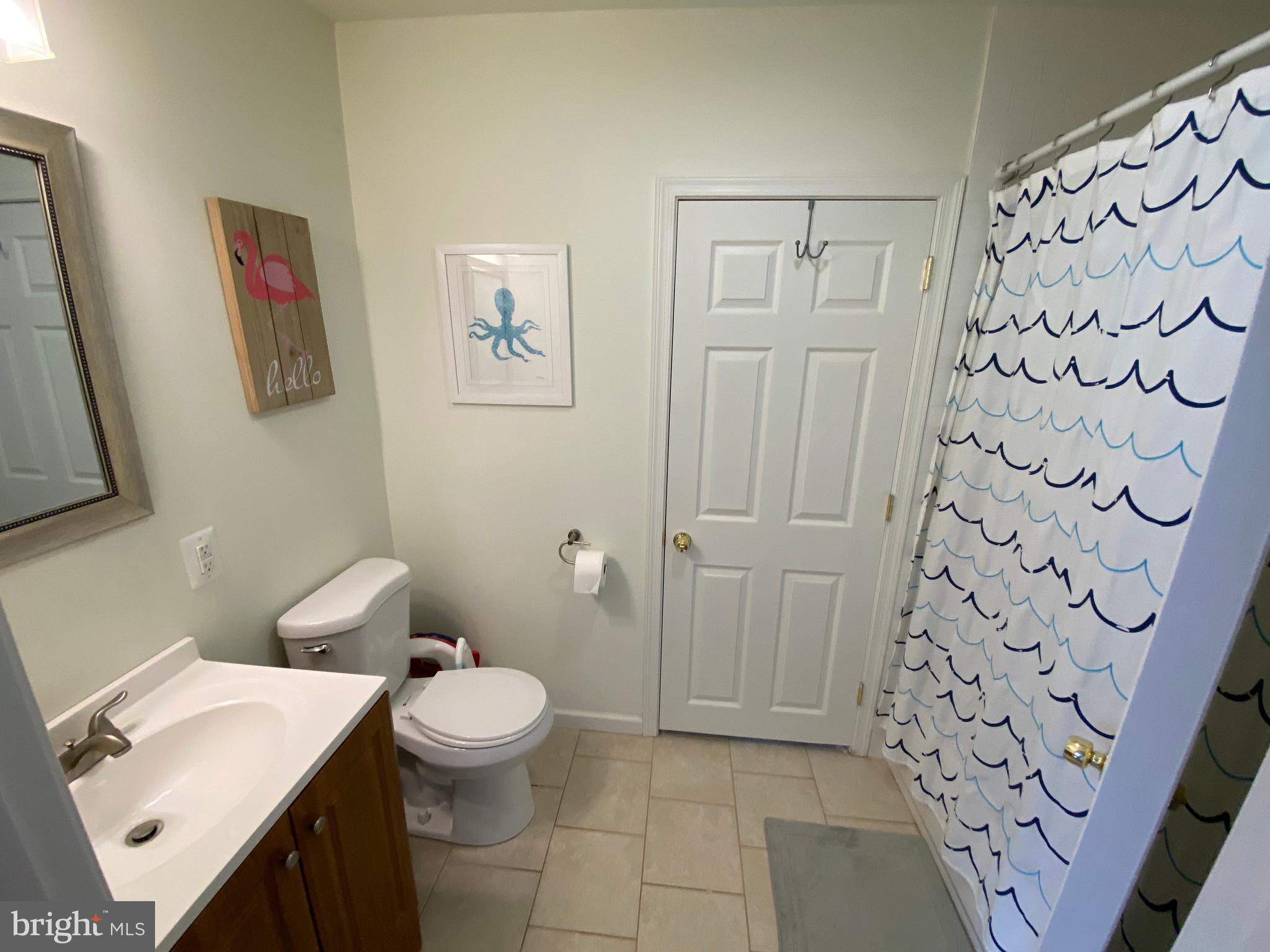 13 Brookside Road Glenside, PA 19038 - Photo 17 of 22 a bathroom with a toilet a sink and a shower