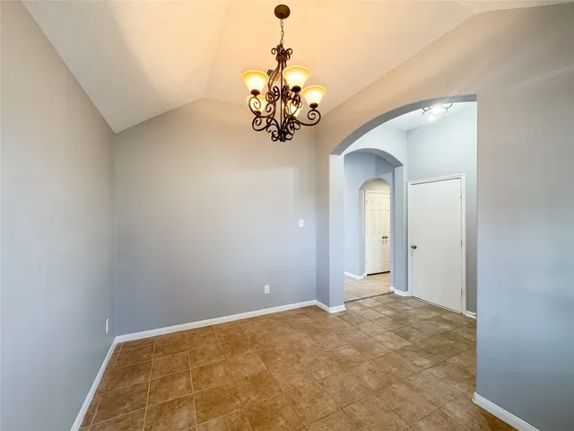a view of a chandelier in a room