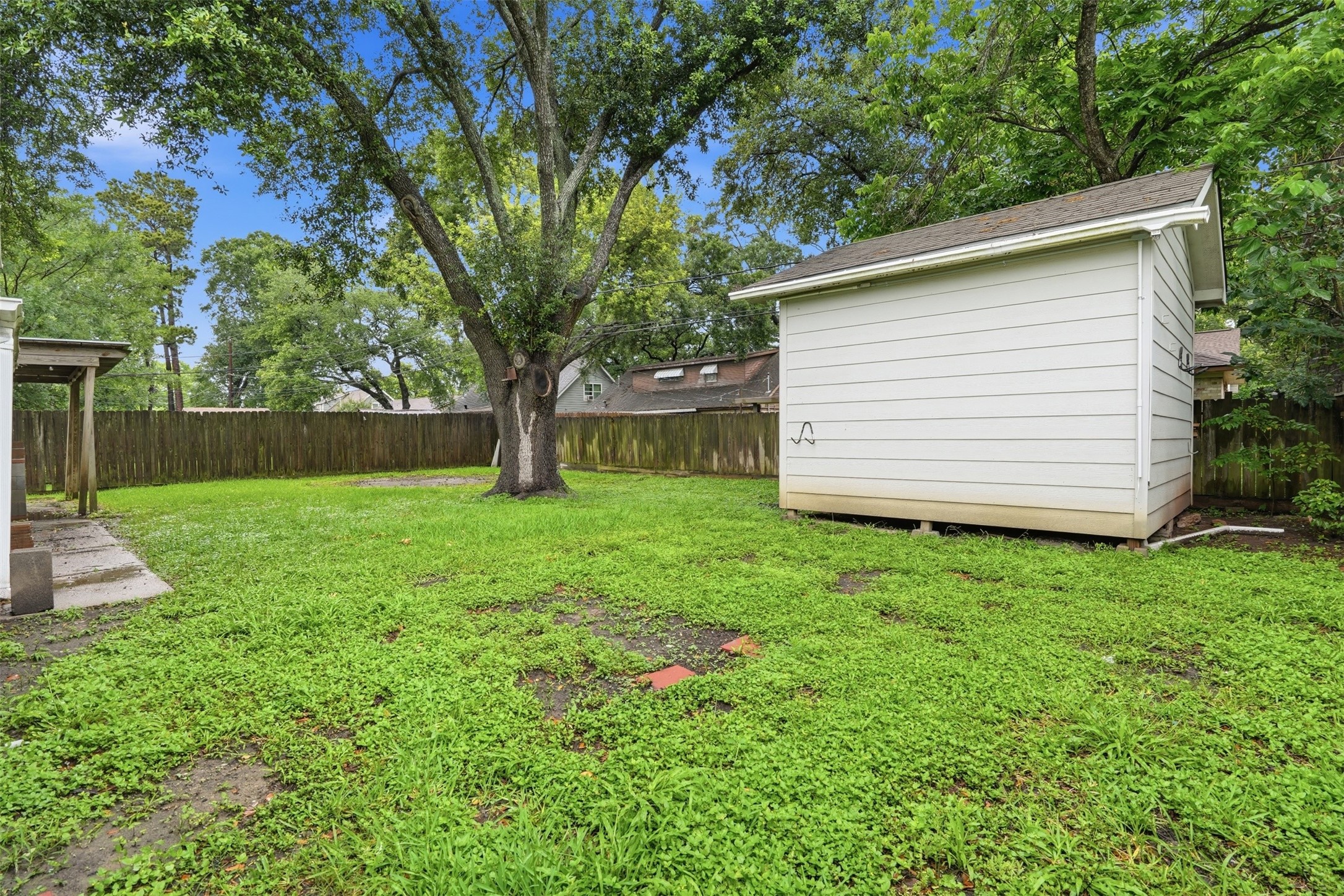 2605 Burke Road Pasadena, TX 77502 - Photo 29 of 29 a view of a backyard with a garden