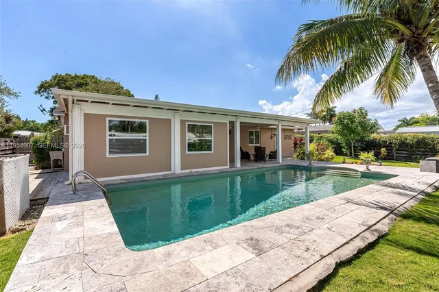a view of a house with a swimming pool