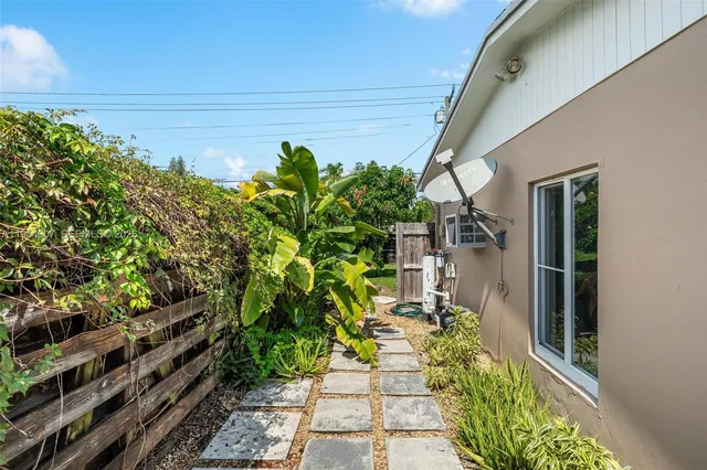 a view of backyard with a table and chair