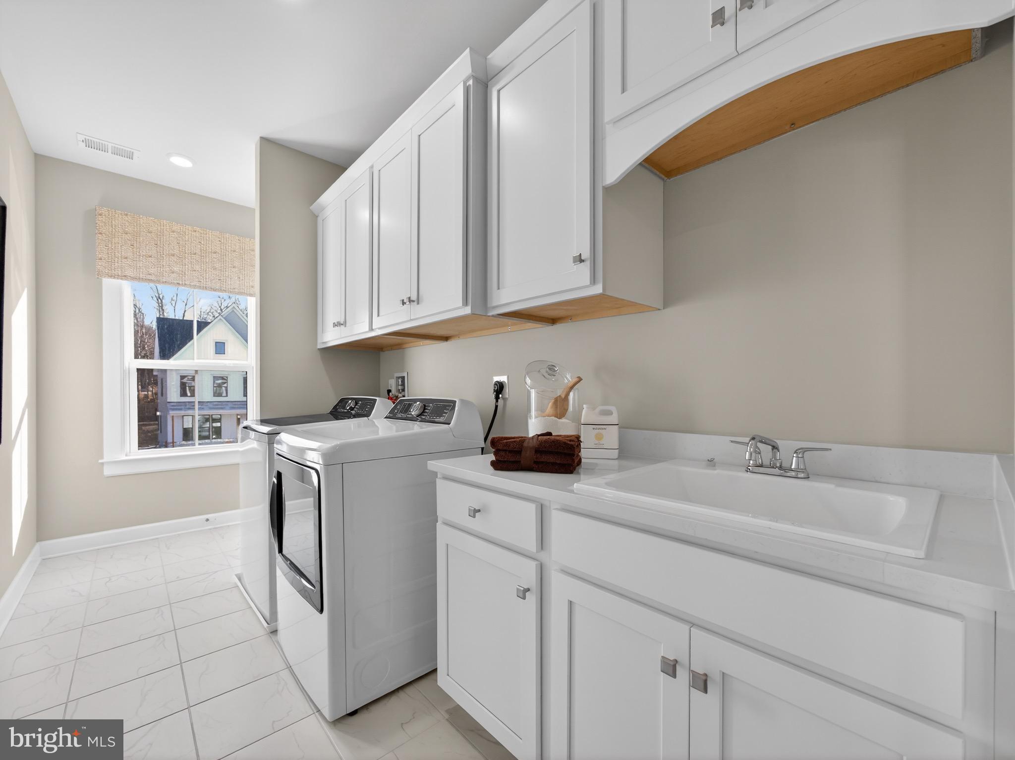 167 Brazier Lane Exton, PA 19341 - Photo 35 of 46 Bright, airy laundry space with modern finishes.