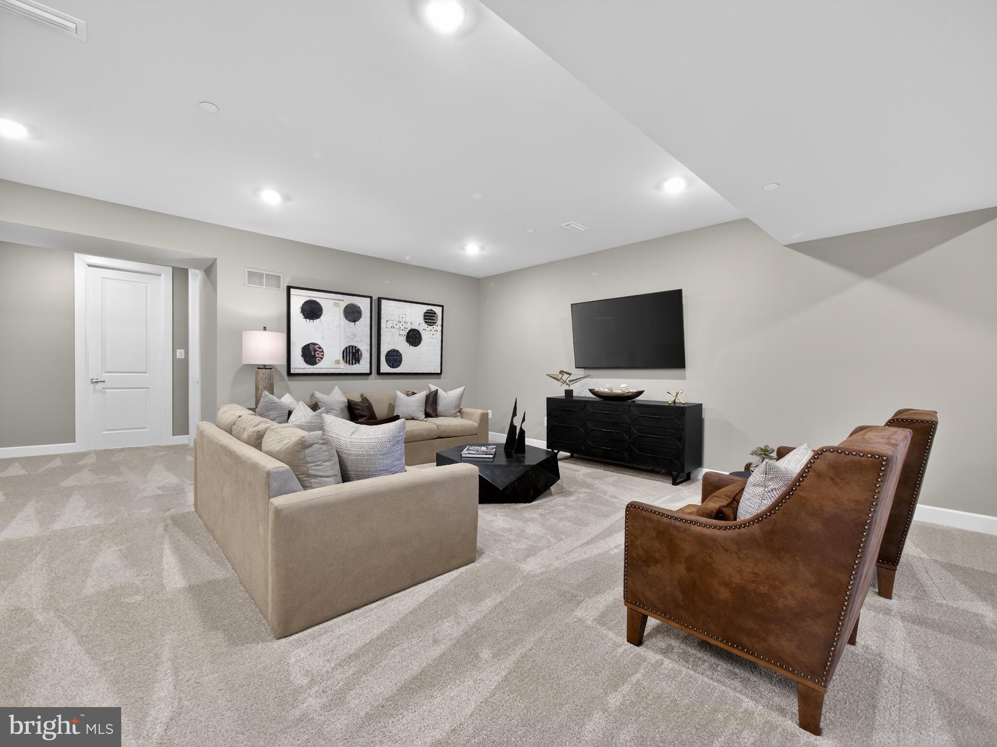 167 Brazier Lane Exton, PA 19341 - Photo 39 of 46 Modern basement retreat with cozy ambiance.