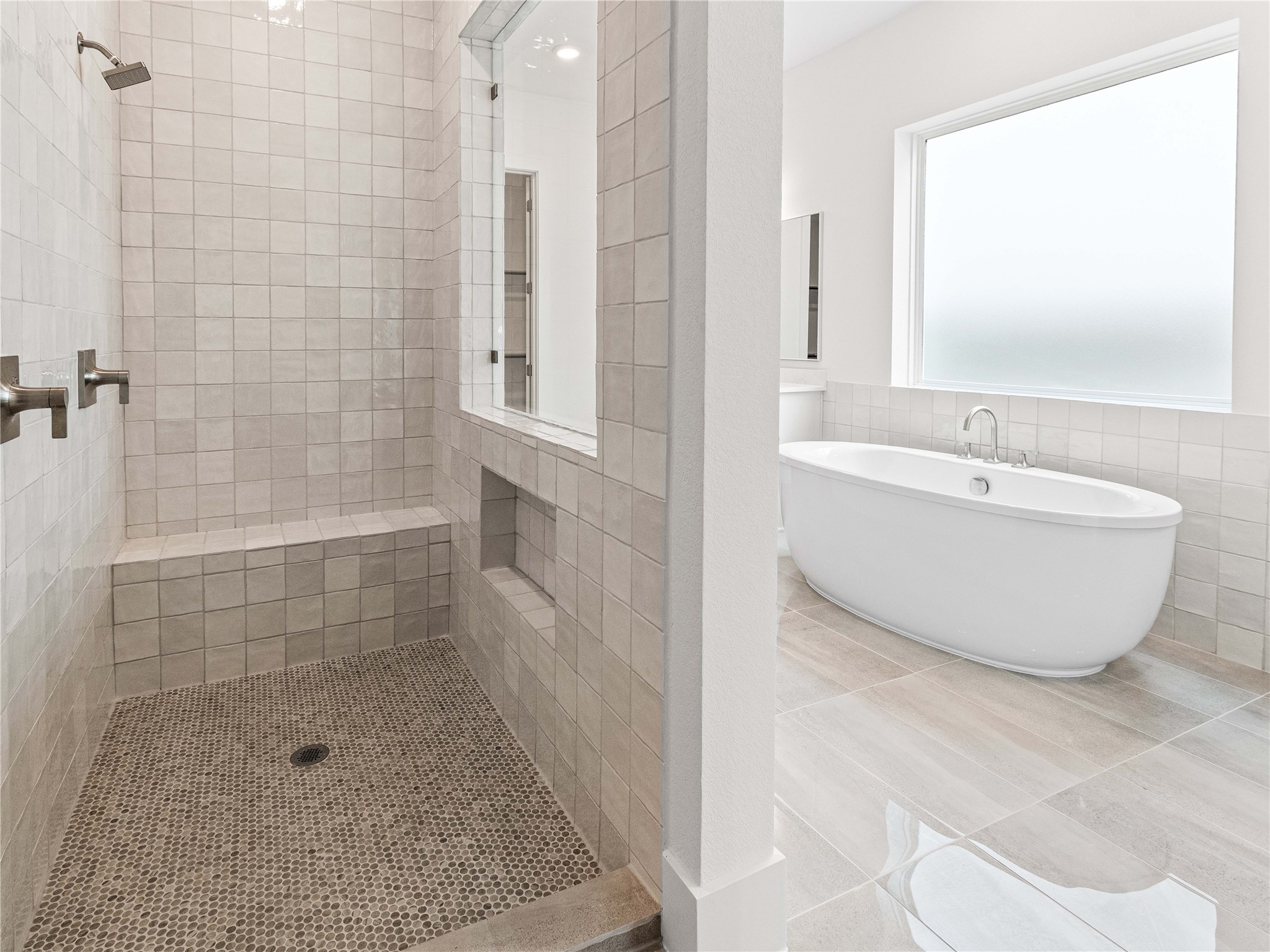 4926 Grapevine Lane Manvel, TX 77578 - Photo 26 of 41 a bathroom with a bathtub and shower