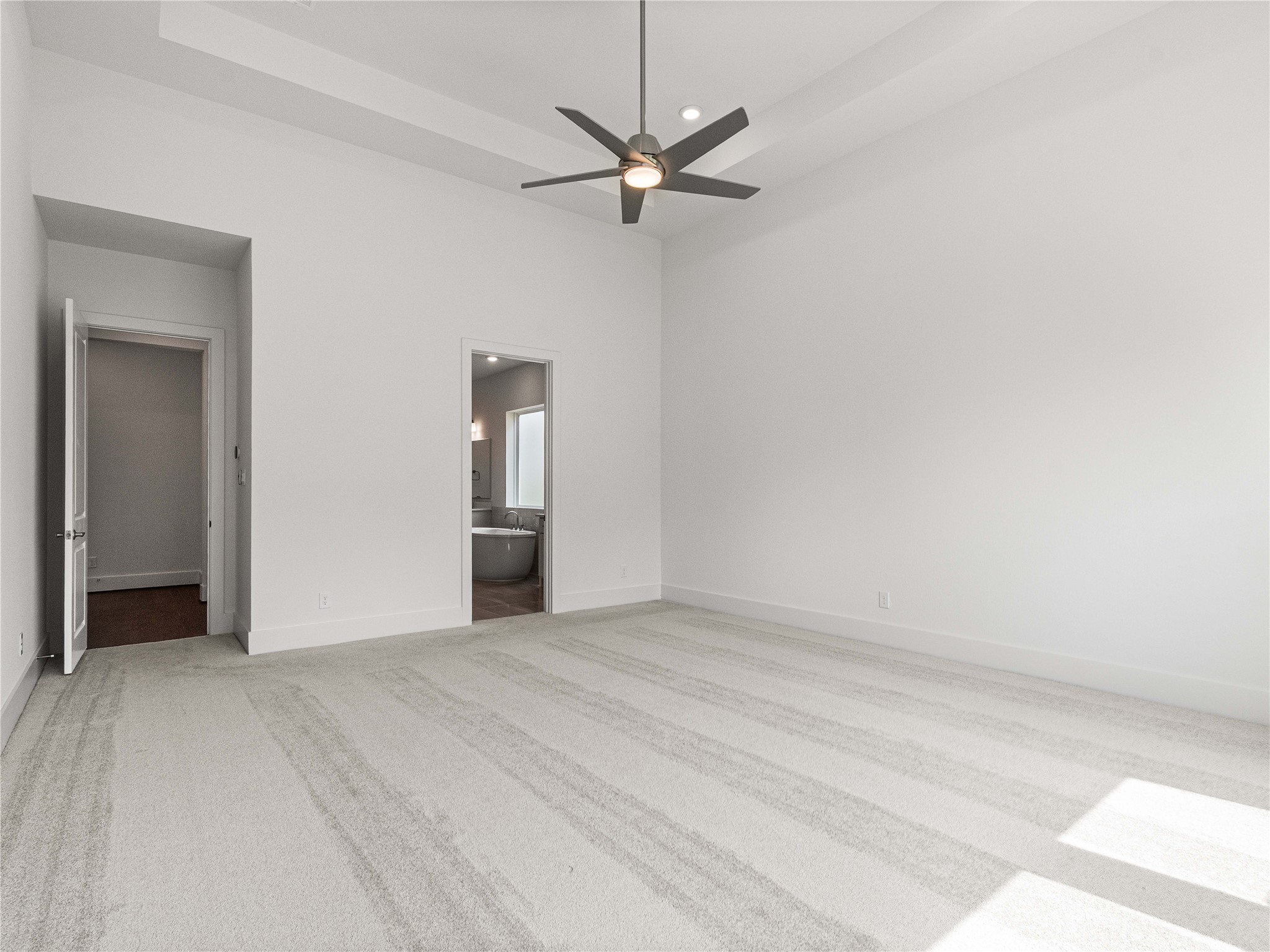 4926 Grapevine Lane Manvel, TX 77578 - Photo 28 of 41 a view of a livingroom with a ceiling fan and wooden floor