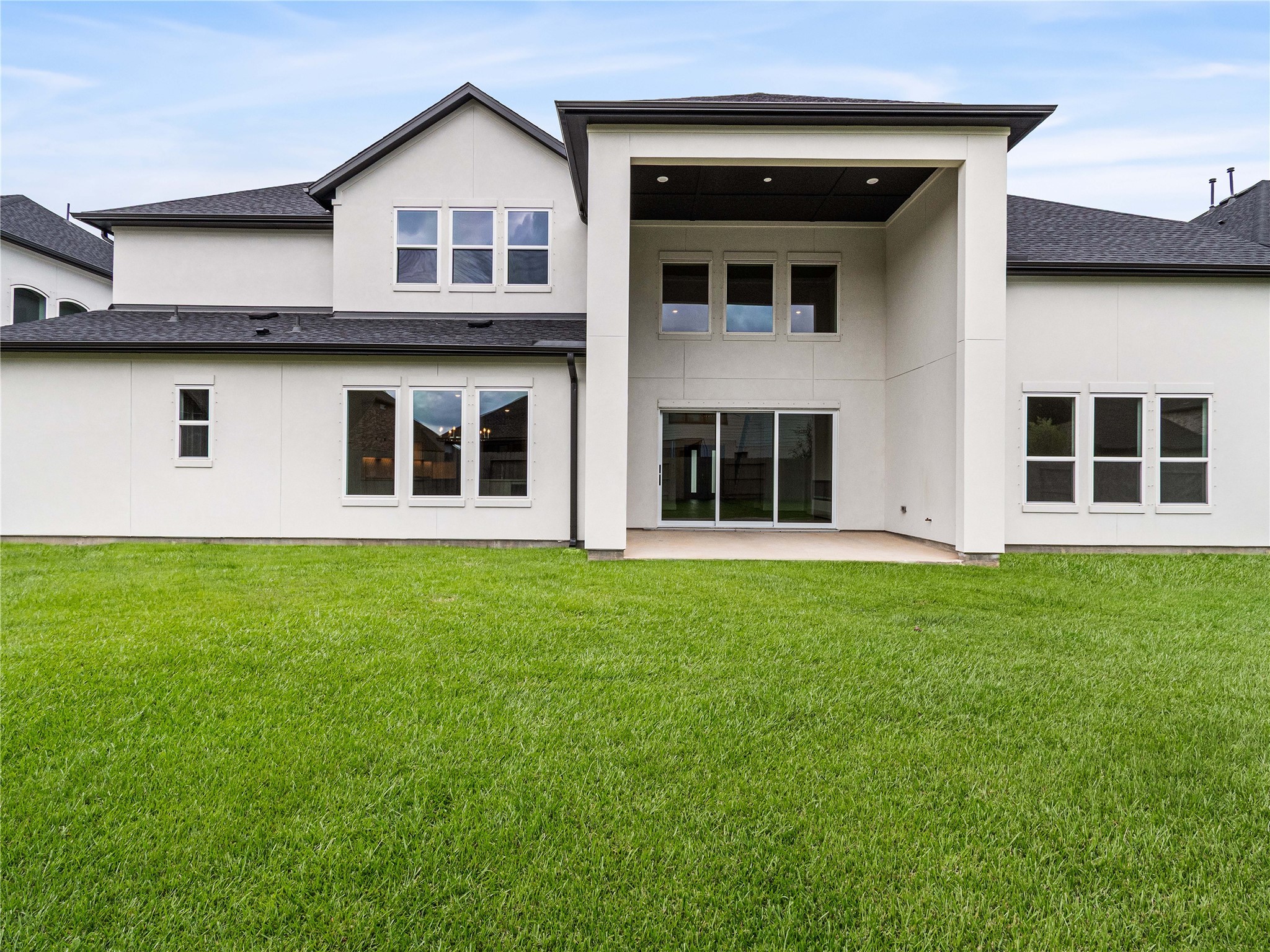 4926 Grapevine Lane Manvel, TX 77578 - Photo 33 of 41 a view of an house with backyard space and windows