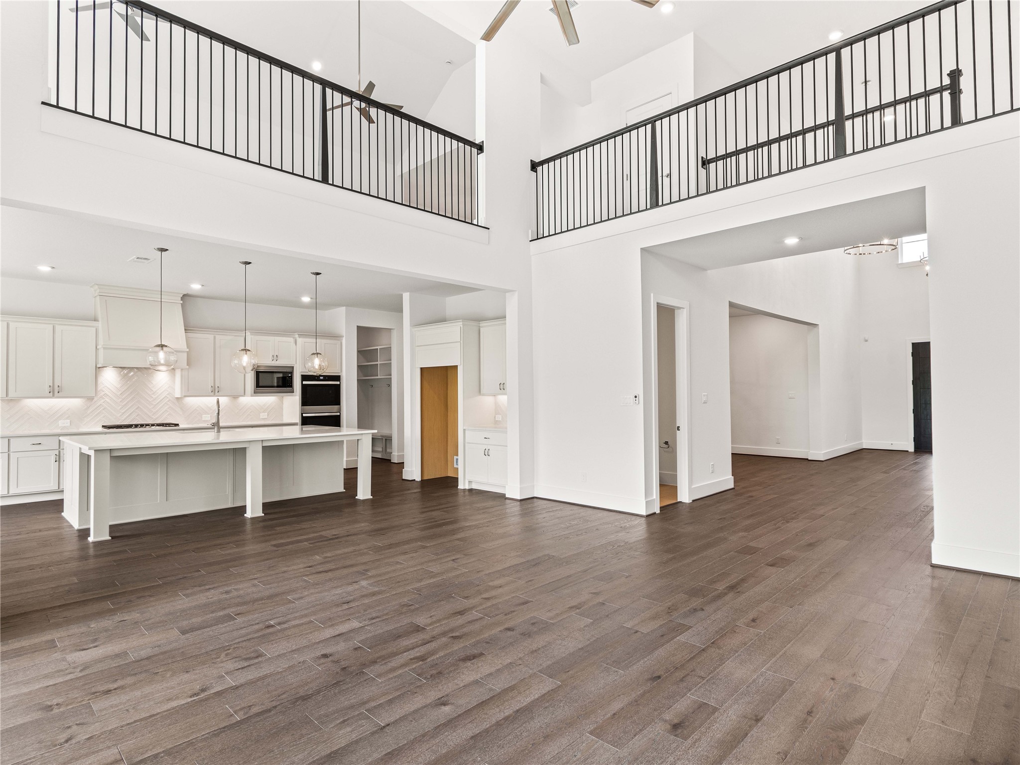 4926 Grapevine Lane Manvel, TX 77578 - Photo 4 of 41 a view of a kitchen with furniture and wooden floor
