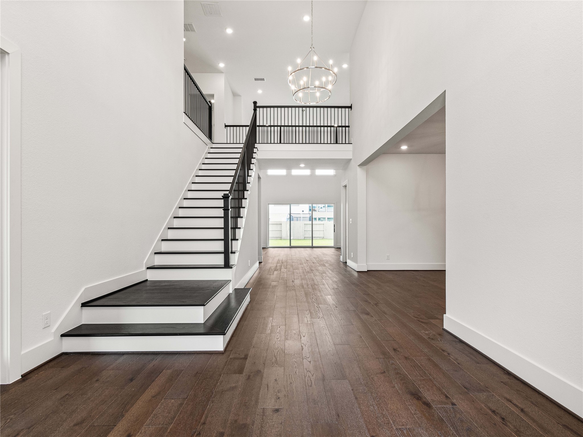 4926 Grapevine Lane Manvel, TX 77578 - Photo 6 of 41 a view of entryway and hall with wooden floor
