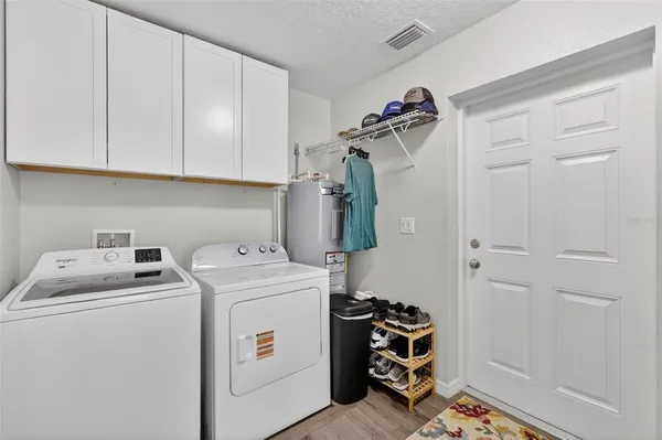 a view of room with washer and dryer
