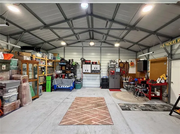 a room with lots of furniture and windows