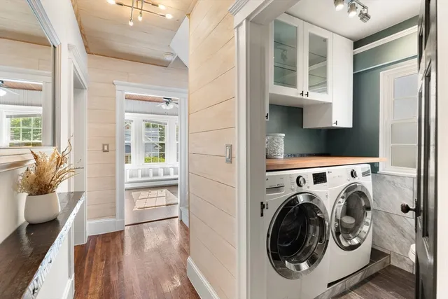 a bathroom with a toilet a sink and a mirror
