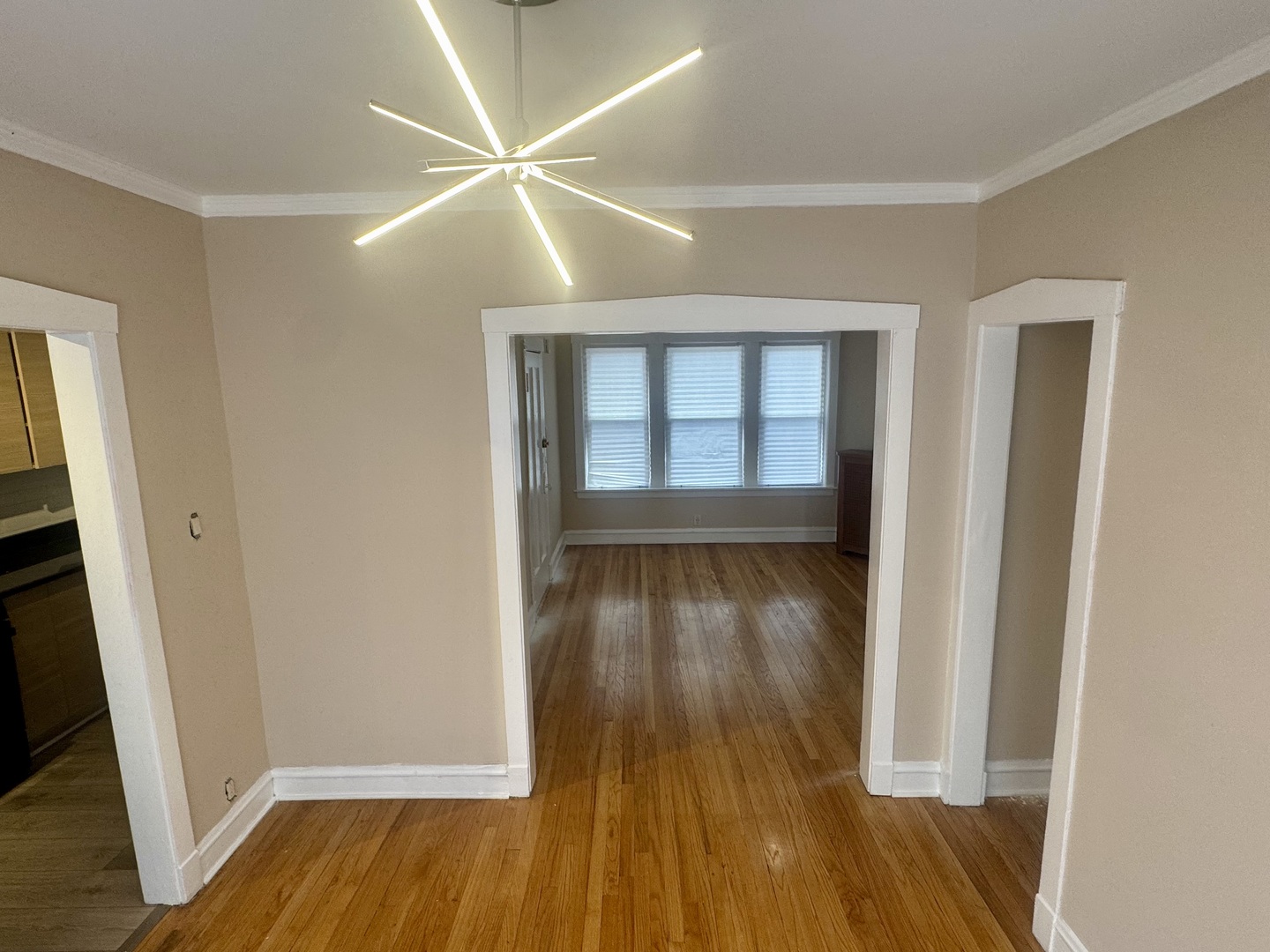 6638 South Greenwood Avenue, Unit 2B Chicago, IL 60637 - Photo 11 of 23 wooden floor in an empty room