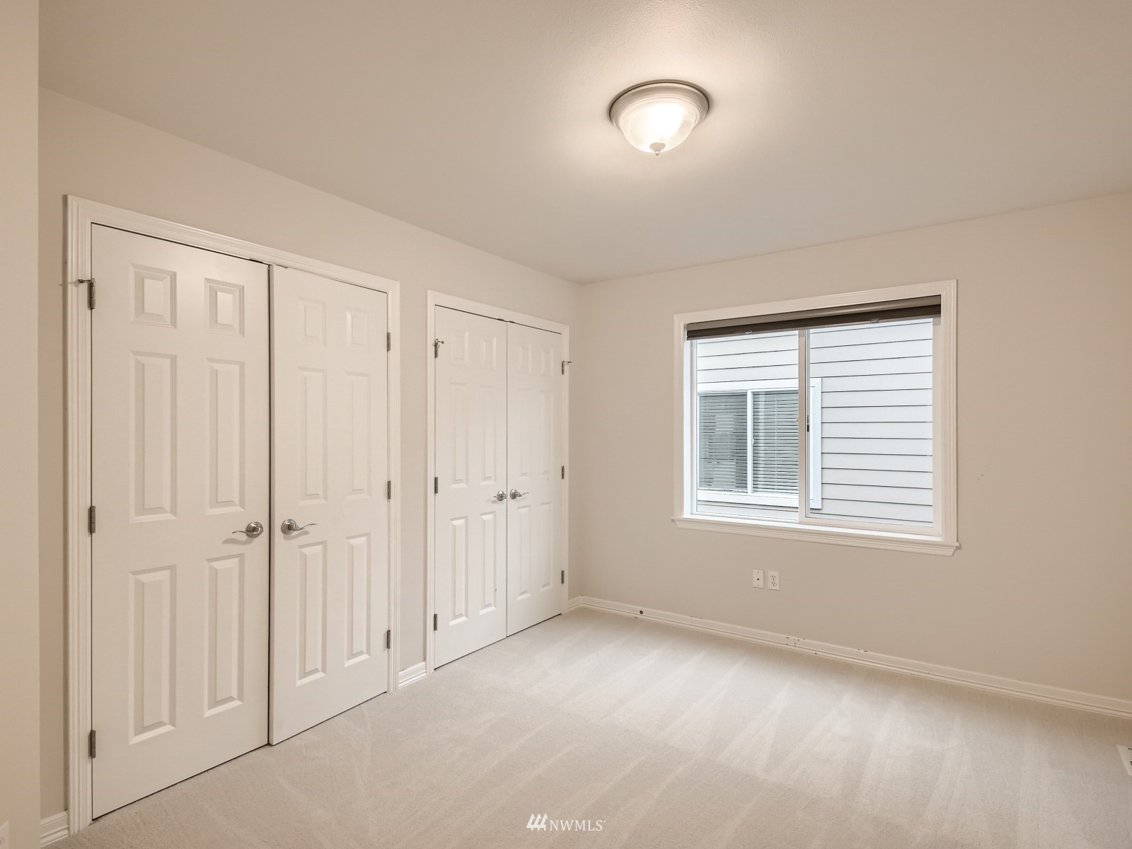 5232 Northeast 3rd Place Renton, WA 98059 - Photo 18 of 28 an empty room with a window