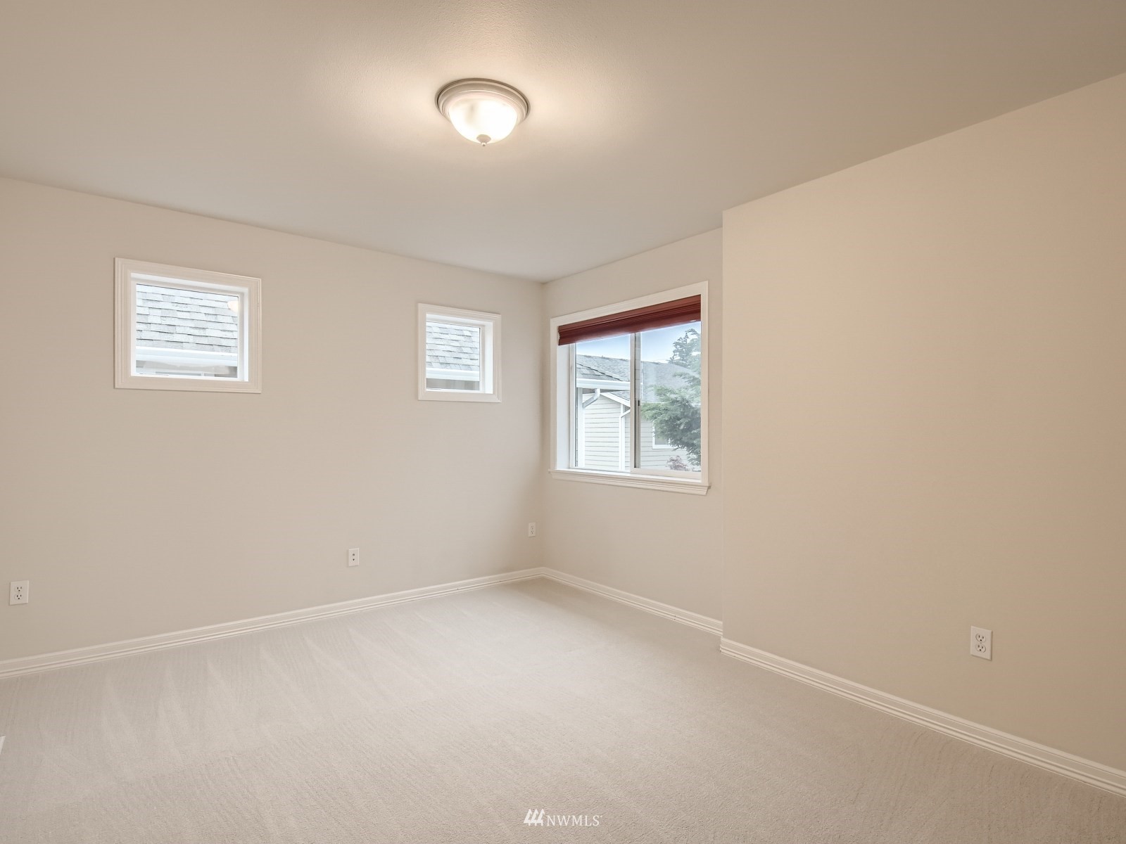 5232 Northeast 3rd Place Renton, WA 98059 - Photo 19 of 28 an empty room with windows