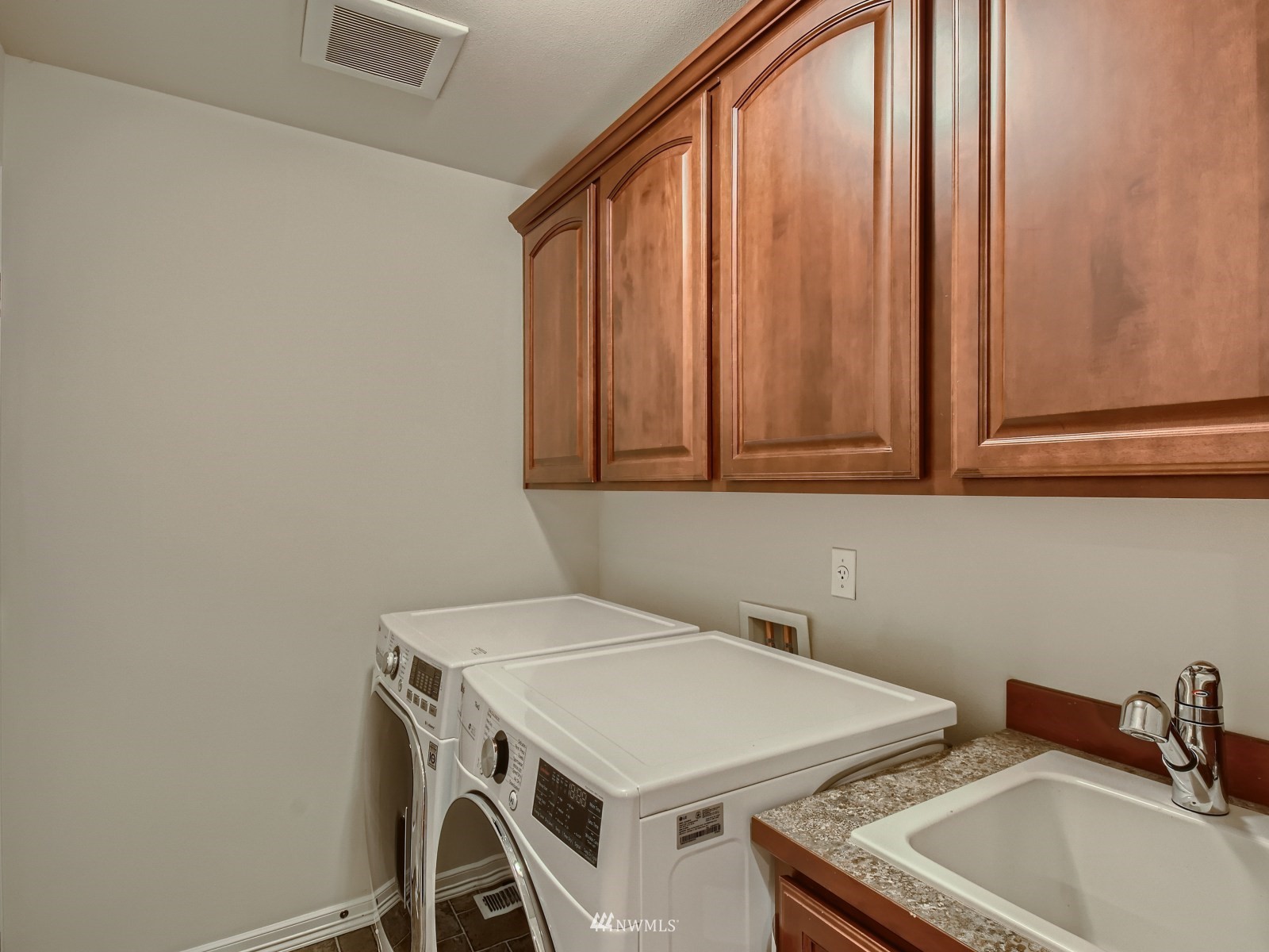 5232 Northeast 3rd Place Renton, WA 98059 - Photo 24 of 28 a utility room with dryer and washer