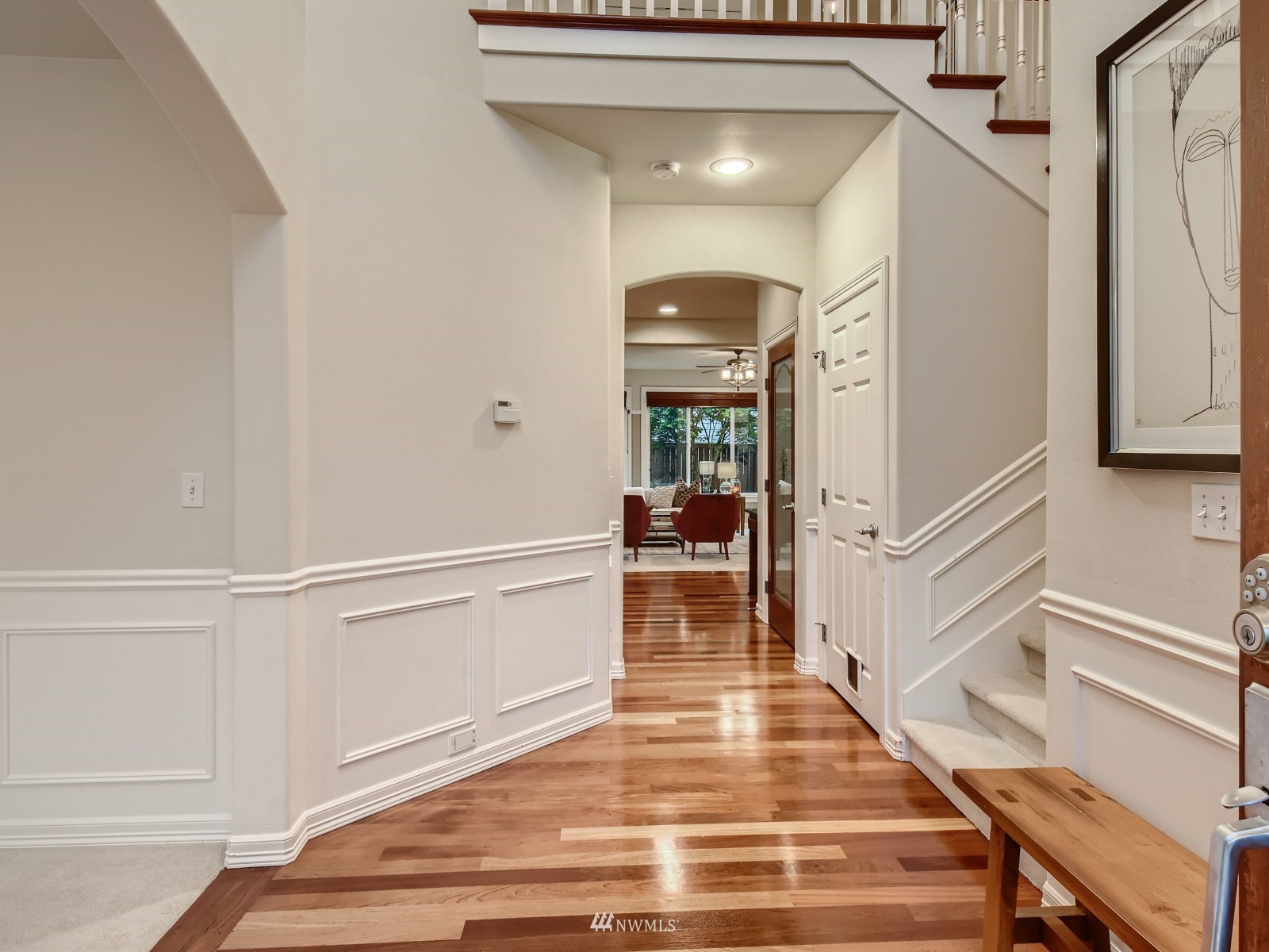 5232 Northeast 3rd Place Renton, WA 98059 - Photo 3 of 28 a view of entryway and hall with wooden floor