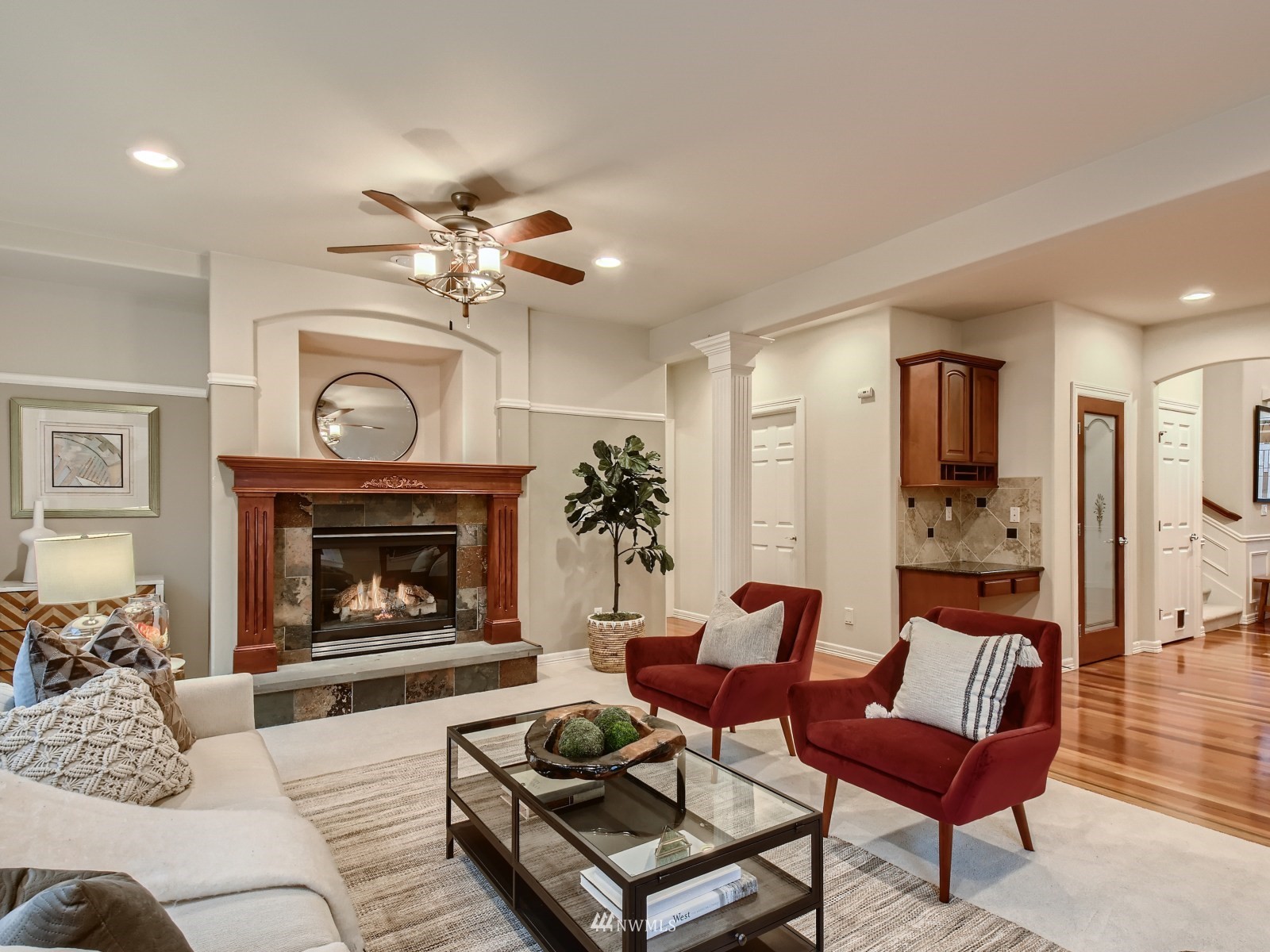 5232 Northeast 3rd Place Renton, WA 98059 - Photo 6 of 28 a living room with furniture and a fireplace