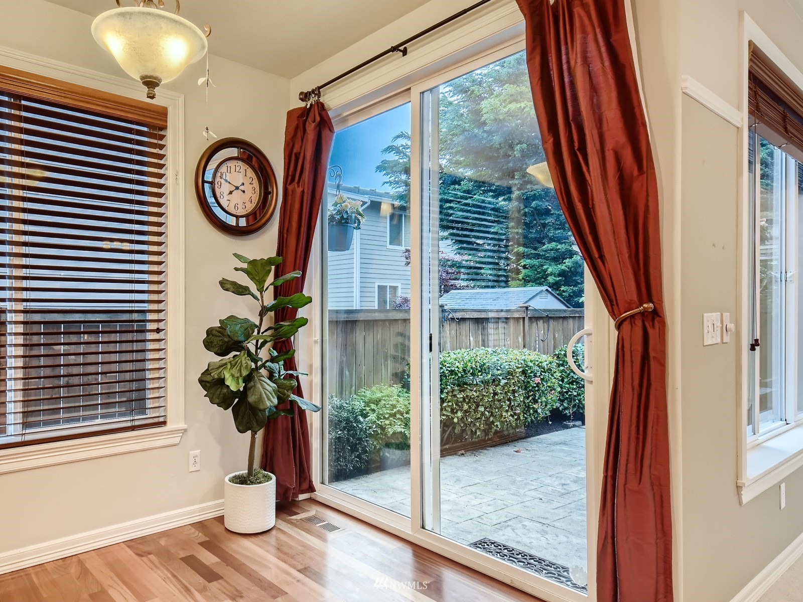 5232 Northeast 3rd Place Renton, WA 98059 - Photo 10 of 28 a front view of a house with a potted plant and a large window