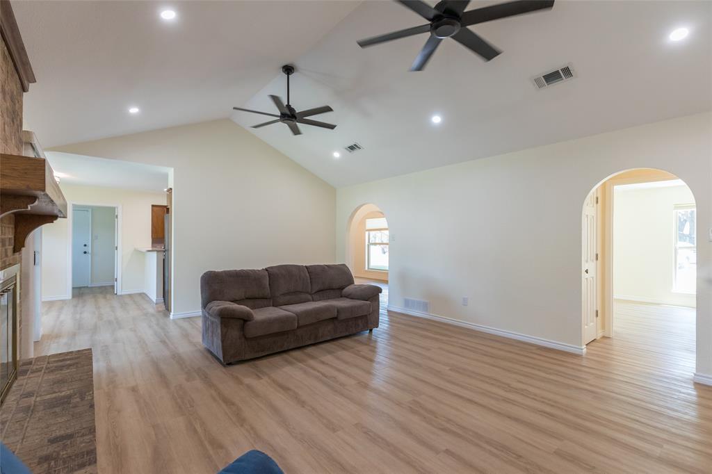 40 Carriage Road Abilene, TX 79605 - Photo 15 of 40 a living room with furniture and a ceiling fan