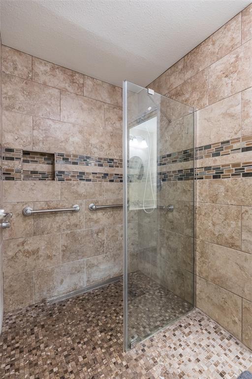 40 Carriage Road Abilene, TX 79605 - Photo 23 of 40 a bathroom with a shower