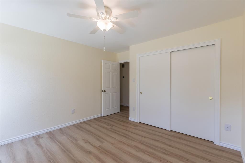 40 Carriage Road Abilene, TX 79605 - Photo 28 of 40 a view of an empty room with wooden floor