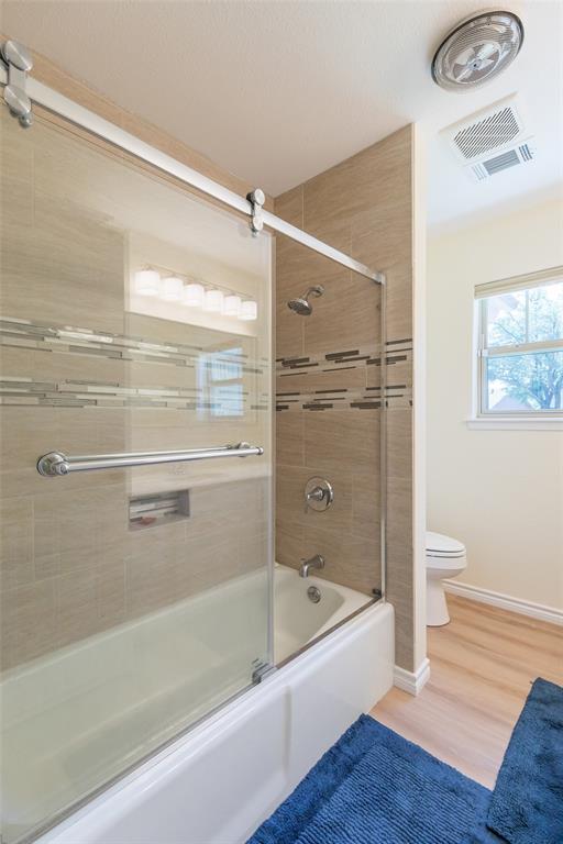 40 Carriage Road Abilene, TX 79605 - Photo 30 of 40 a bathroom with a bathtub and a shower