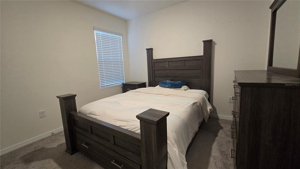 1784 Bull Hl Road Kissimmee, FL 34744 - Photo 14 of 33 a close up of a bed