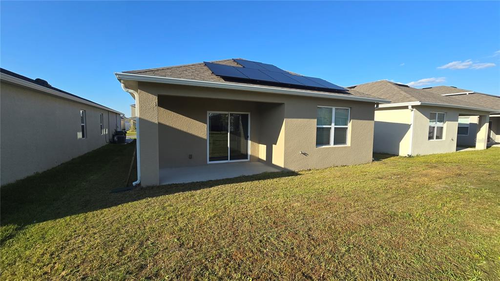 1784 Bull Hl Road Kissimmee, FL 34744 - Photo 24 of 33 a front view of a house with a yard
