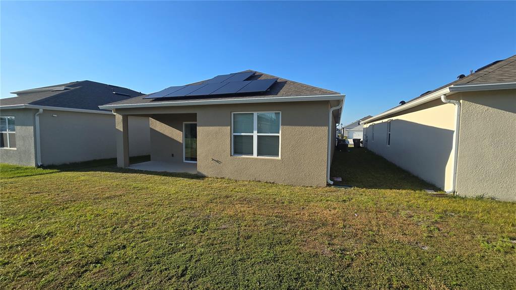1784 Bull Hl Road Kissimmee, FL 34744 - Photo 25 of 33 a view of an house with backyard