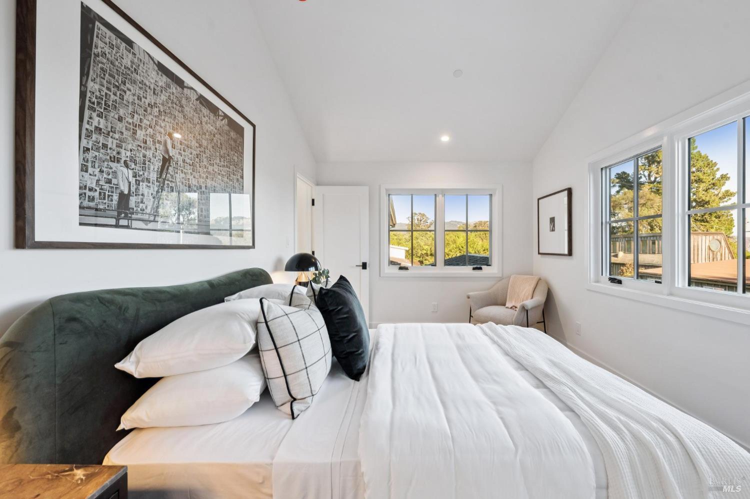 185 Elm Road Bolinas, CA 94924 - Photo 19 of 43 a bed sitting in a bedroom next to a window