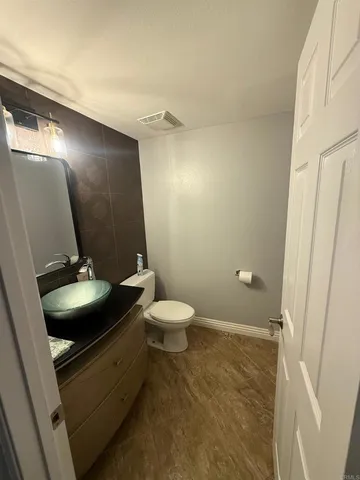 a bathroom with a toilet and a sink