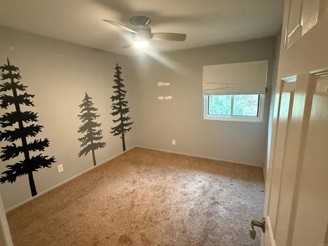 a view of a room with a staircase