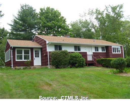 9 Fairchild Road Simsbury, CT 06081 - Photo 1 of 1 a view of a house with a yard and plants