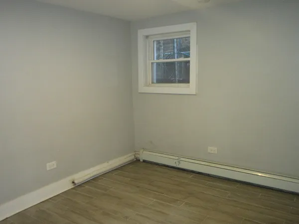 wooden floor and white walls
