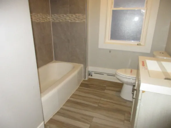 a bathroom with a sink and a toilet