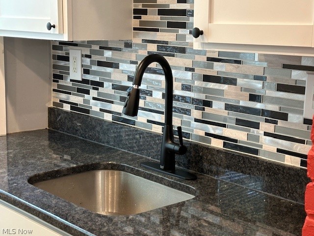 1388 Brookline Road Cleveland, OH 44121 - Photo 14 of 30 Interior details featuring sink and tasteful backsplash